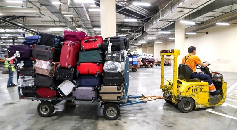 Повреждение багажа при транспортировке не входит в стандартную страховку. Фото Станислава КРАСИЛЬНИКОВА/ТАСС.